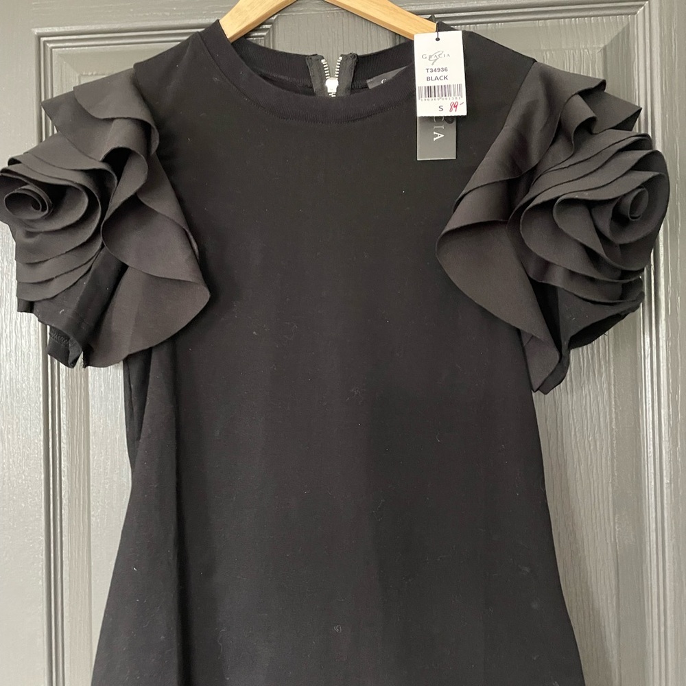 Black short sleeved knit top with flower shaped sleeves -Brand New
